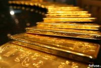 Gold retreats from weekly high as dollar strengthens