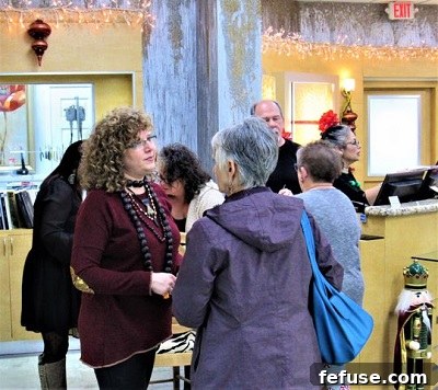 Uri Freijanes, left, welcomes customers to the new store