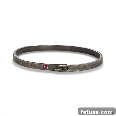 Bangle in oxidized sterling silver with a 0.09 ct. ruby, $275