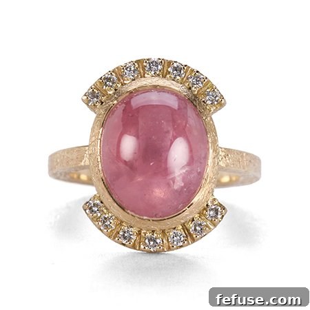 Ring in 14k gold with a 9.85 ct. star sapphire and 0.21 ct. t.w. diamonds, $2,025