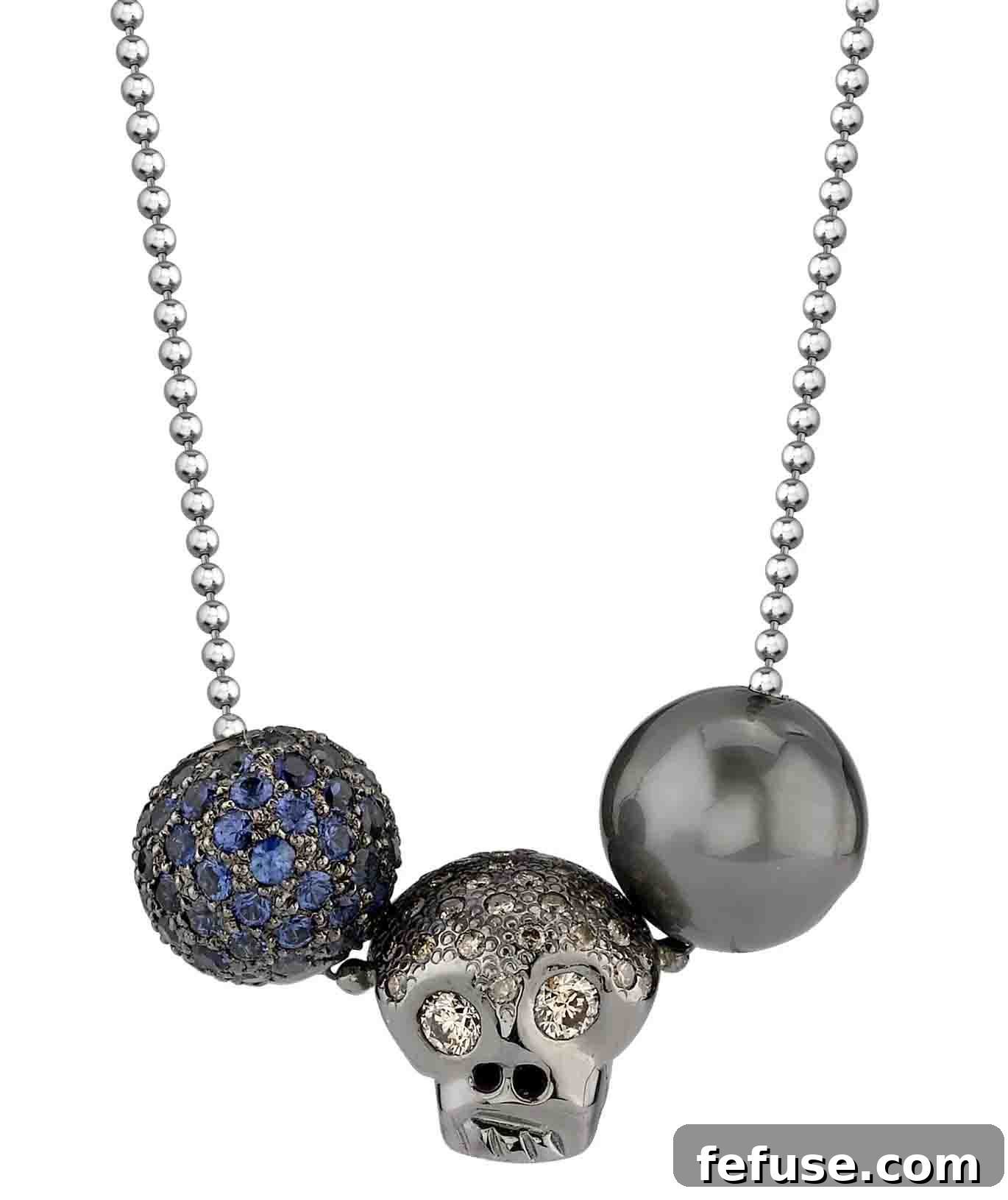 Skull and beads pendant with Tahitian pearl, sapphires, and brown diamonds