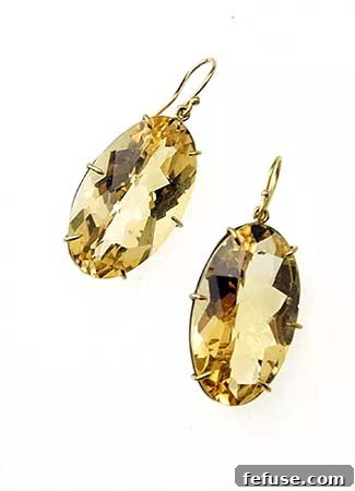Earrings with large citrine gemstones