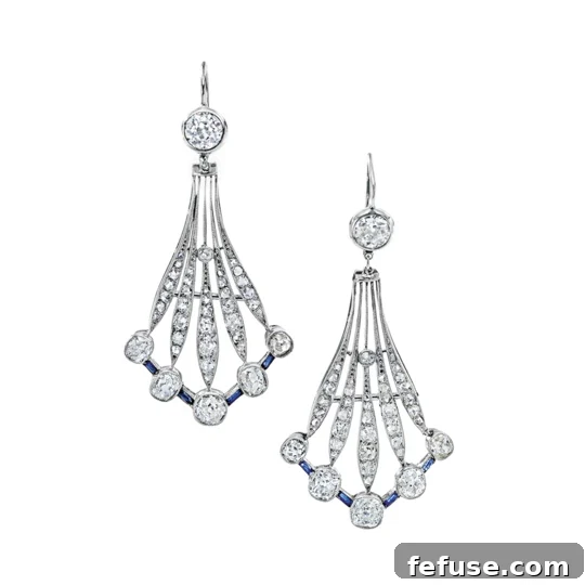 Diamond and Sapphire Drop Earrings - Sapphire drop earrings from Stephen Silver with old mine cut diamonds and step-cut sapphires in platinum with millegrain detail.