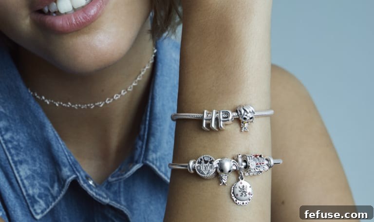 Pandora Harry Potter Collection charms including Golden Snitch, Dobby, and Hogwarts Express