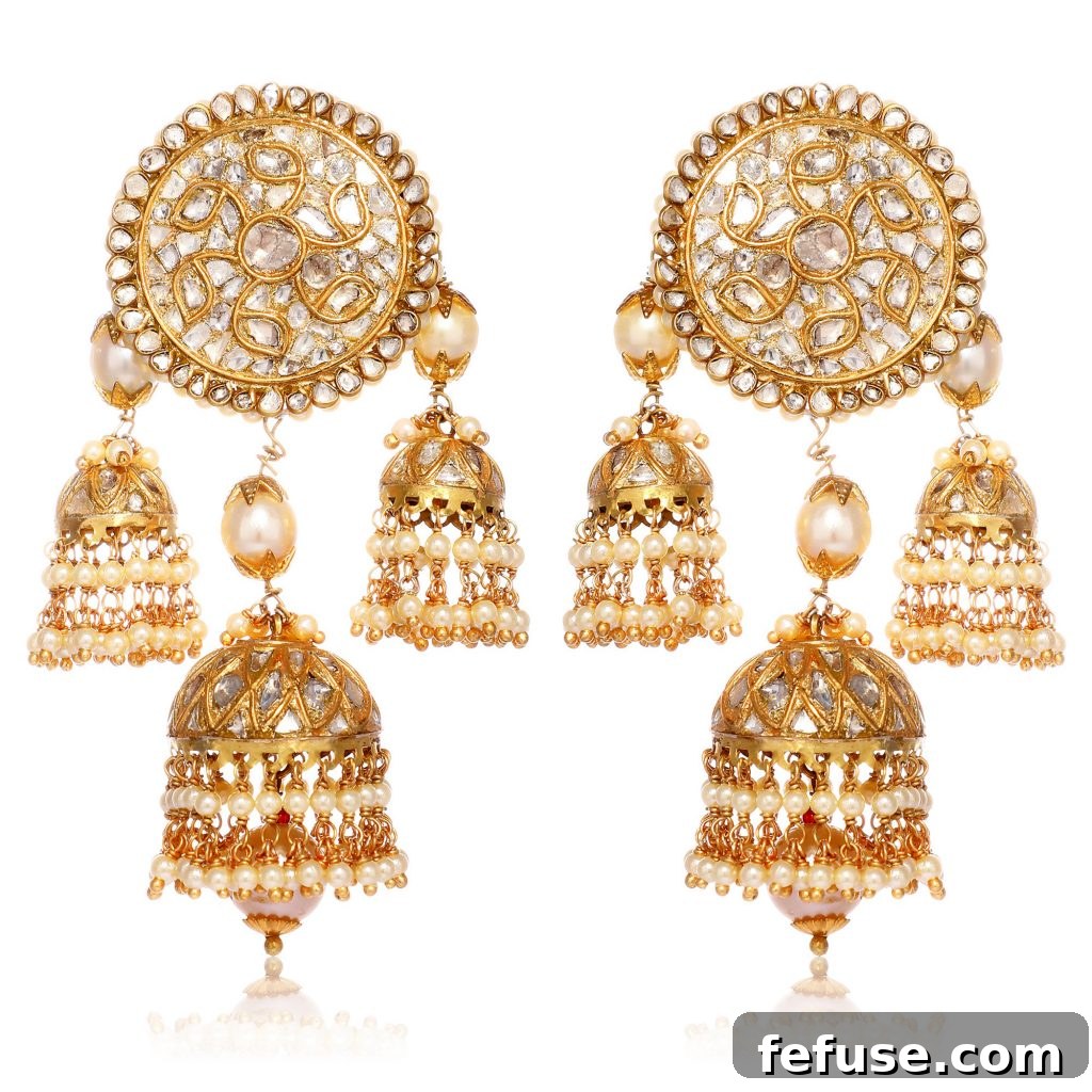 Exquisite Latique uncut diamond earrings set in 22k gold, showcasing traditional Indian craftsmanship for a touch of glamour.