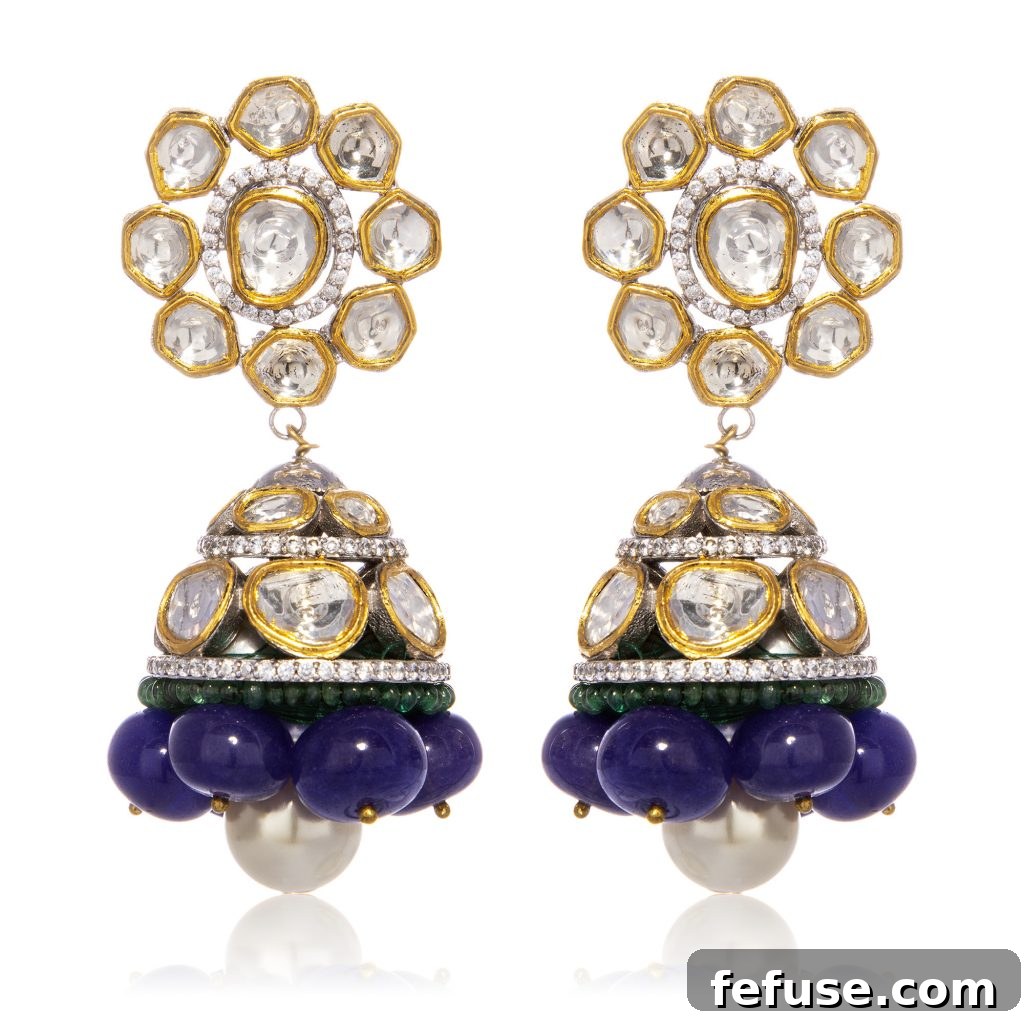 Intricately handcrafted Tanzanite and diamond jhumka earrings from Latique, blending traditional design with contemporary elegance.