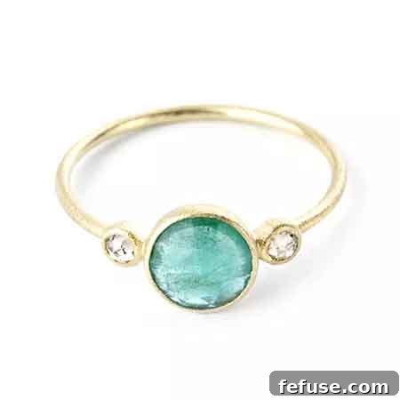 Romantic rose-cut emerald engagement ring in 14k gold with diamond accents