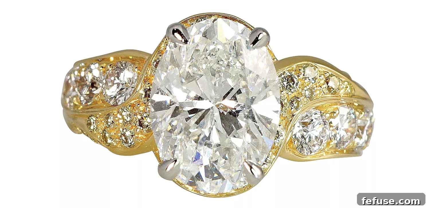 Jill custom engagement ring in 18k yellow gold and platinum with a 3.52 ct. oval center diamond