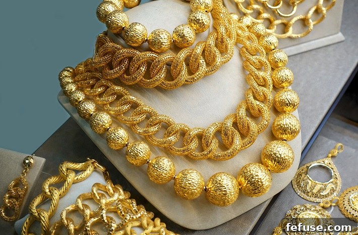 Shaping Sparkle 7 Pivotal Jewelry Design Innovations 2 Various gold necklaces, chains and bracelets on the jewelery display.