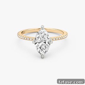 The Art of the Stack: Pairing Engagement Ring Shapes with the Perfect Wedding Band 9 The Classic Two Tone Ring in 14k Rose Gold and Platinum (Featuring a Marquise Cut Stone and Pavé Band)