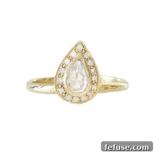 wedding style yellow gold rings: Elegant Yellow Gold Ring with Unique Detailing