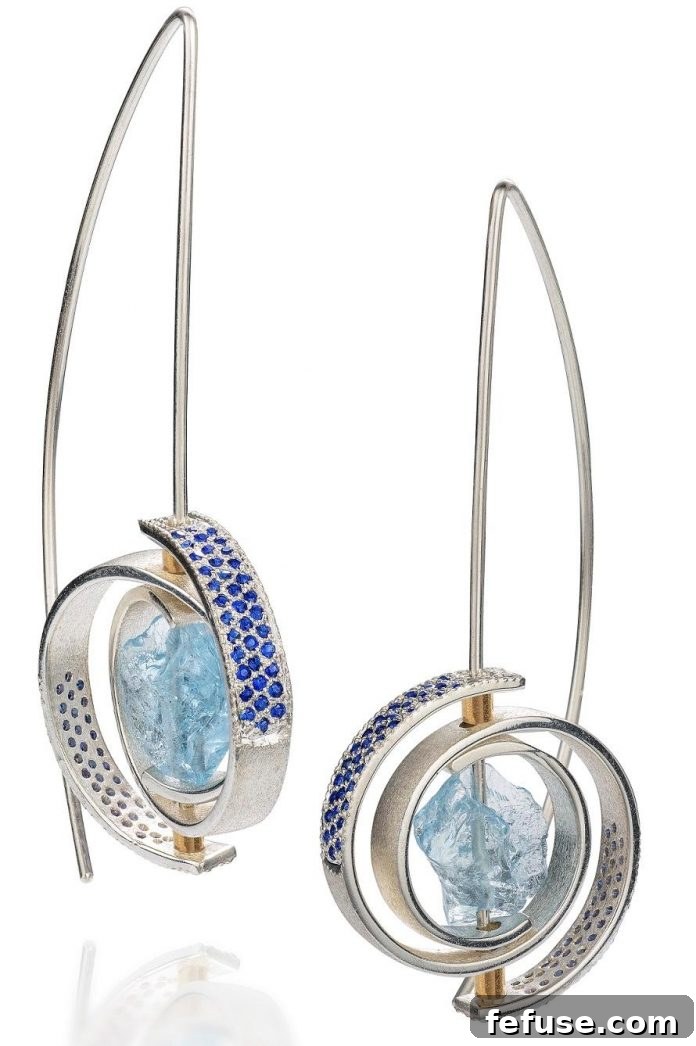 Ceres earrings from Martha Seely's Inspiro collection featuring aquamarine and blue sapphires