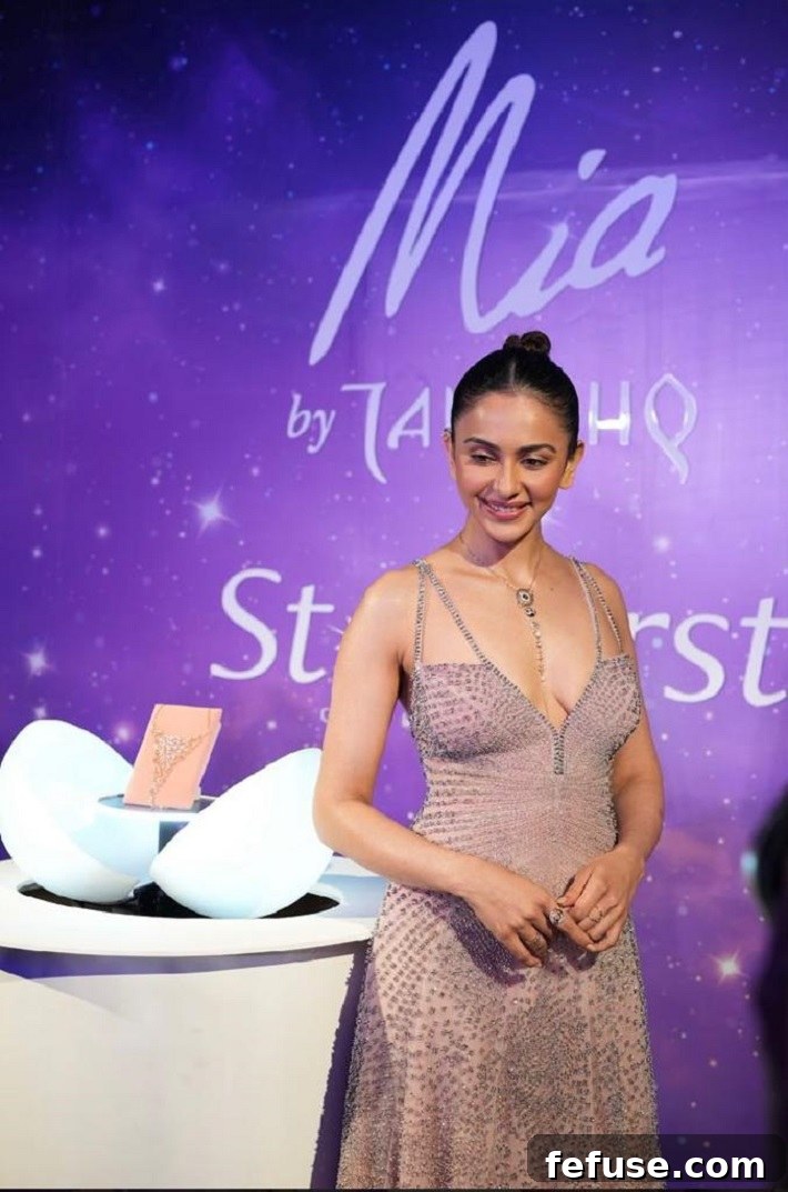 Actress Rakul Preet Singh radiant in jewels from the Mia by Tanishq Starburst collection, showcasing celestial-inspired gold and diamond designs perfect for festive occasions like Diwali, Navratri, and Durga Pujo.