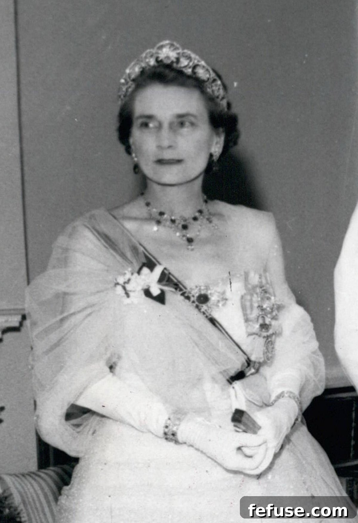 Princess Alice, Duchess of Gloucester, gracefully wears the Honeysuckle Tiara during a visit to Nigeria in May 1959, showcasing its elegance.