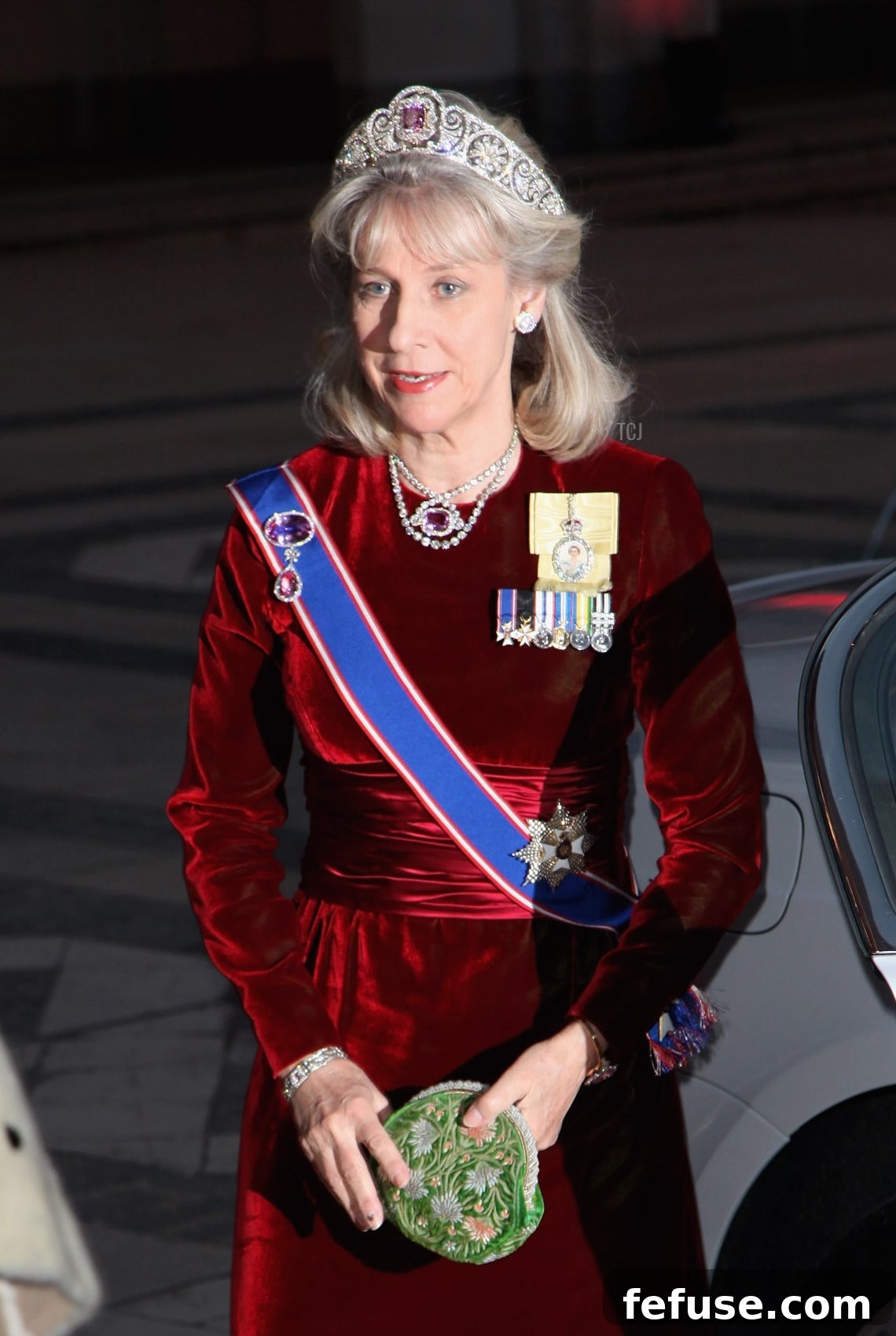 The Duchess of Gloucester, Birgitte, arriving at The State Banquet at Guildhall, wearing the Honeysuckle Tiara with an emerald central element, perfectly complementing her ensemble on March 31, 2009.