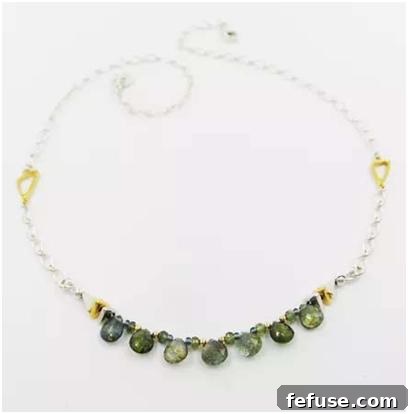 Necklace featuring sapphire briolettes in sterling silver and 22k gold vermeil
