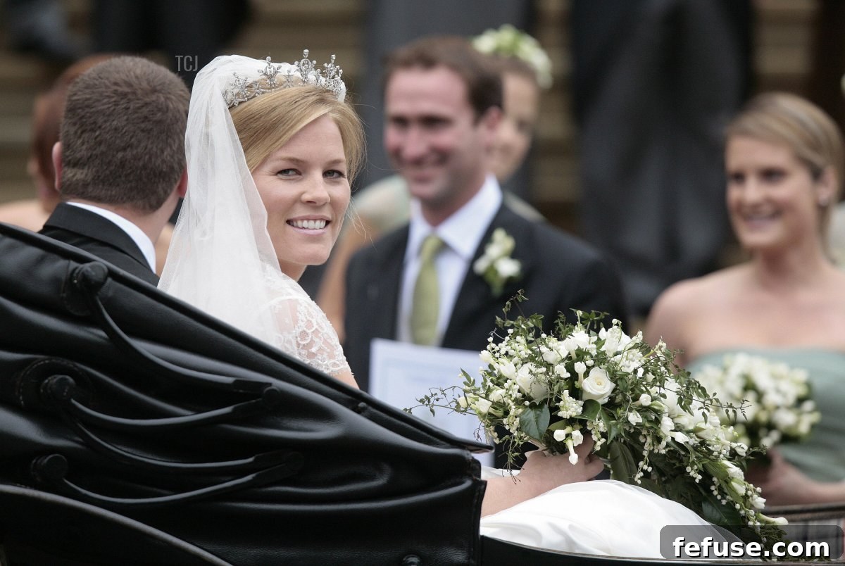 Peter Phillips 30, (L) and Autumn Kelly 31, (2nd R) leave St George's Chapel in Windsor on May 17, 2008 after their marriage vows