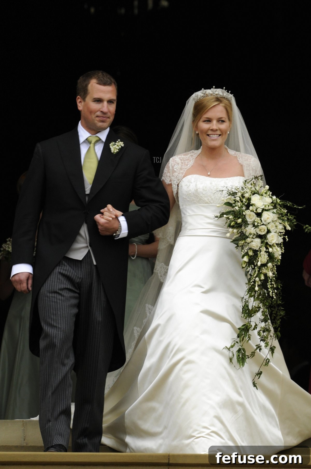 Peter Phillips 30, (L) and Autumn Kelly 31, (R) leave St George's Chapel in Windsor on May 17, 2008 after their marriage vows