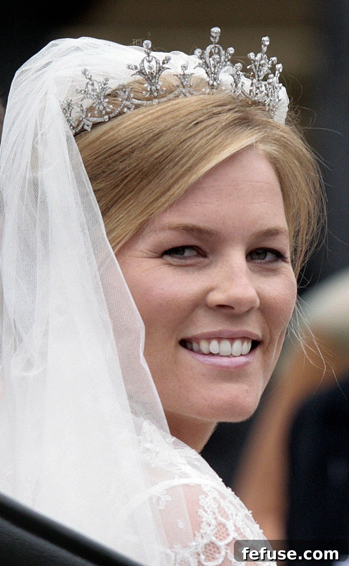 Peter Phillips 30, (not in photo) and Autumn Kelly 31, leave St George's Chapel in Windsor on May 17, 2008 after their marriage vows