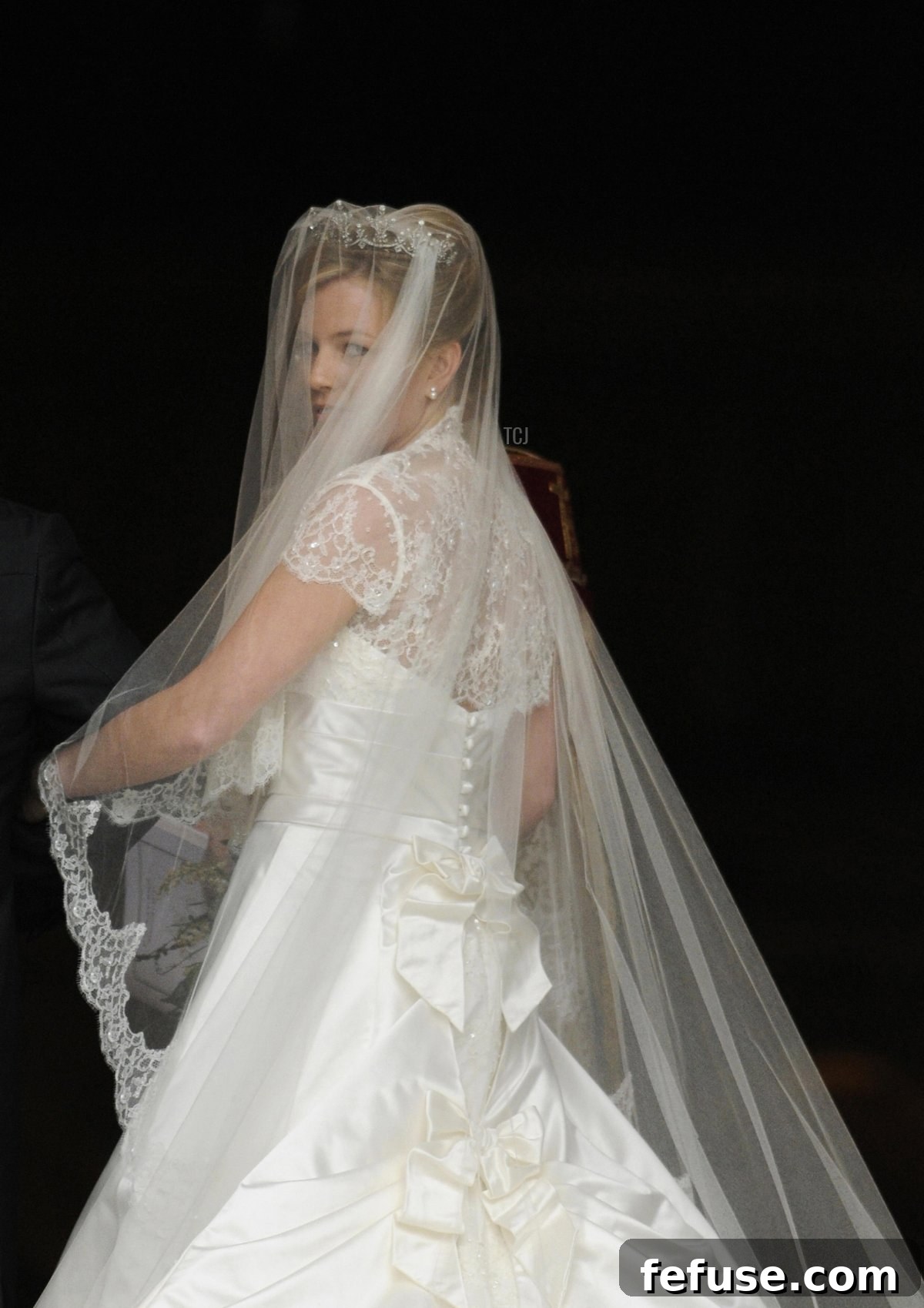 Autumn Kelly 31 looks over her shoulder as she enter St George's Chapel in Windsor on May 17, 2008 to be wed to Peter Phillips 30