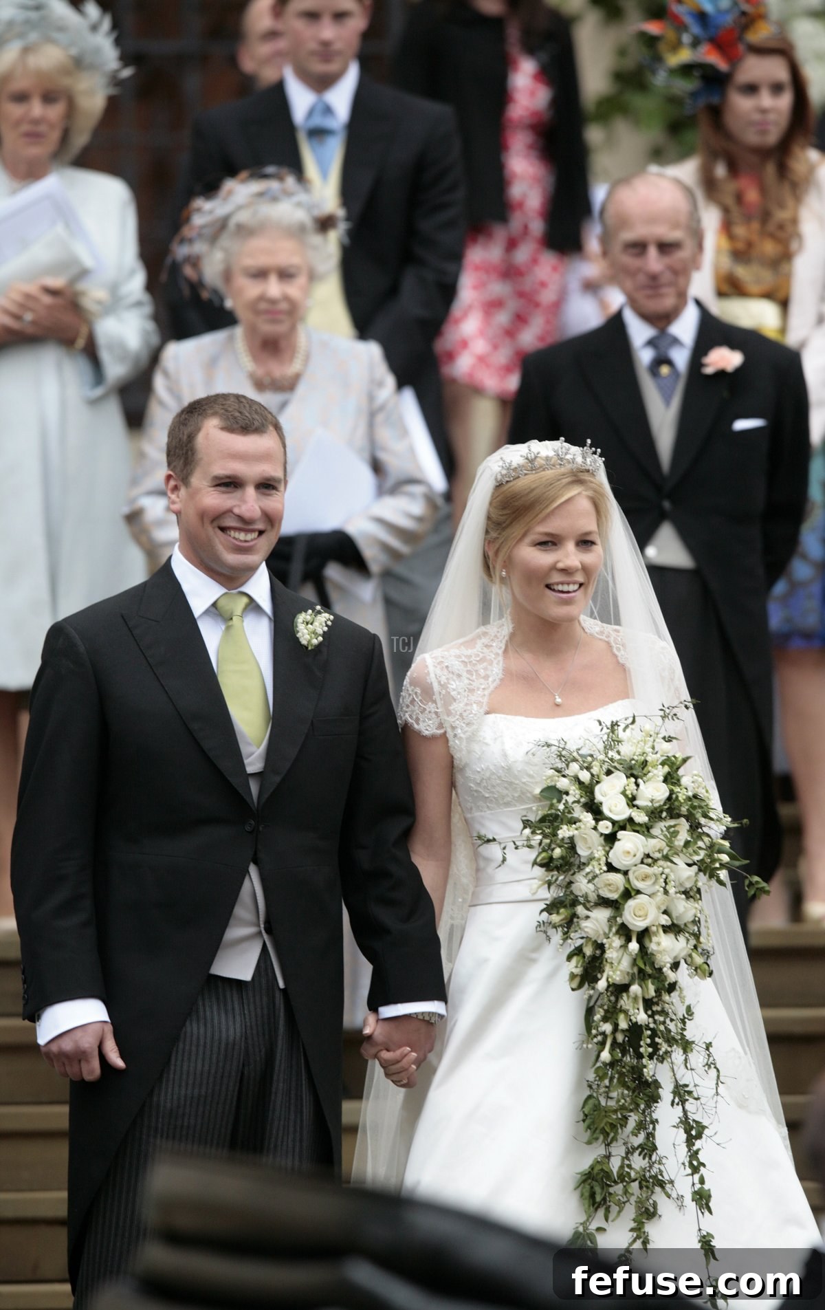 Peter Phillips 30, (L) and Autumn Kelly 31, (R) leave St George's Chapel in Windsor on May 17, 2008 after their marriage vows