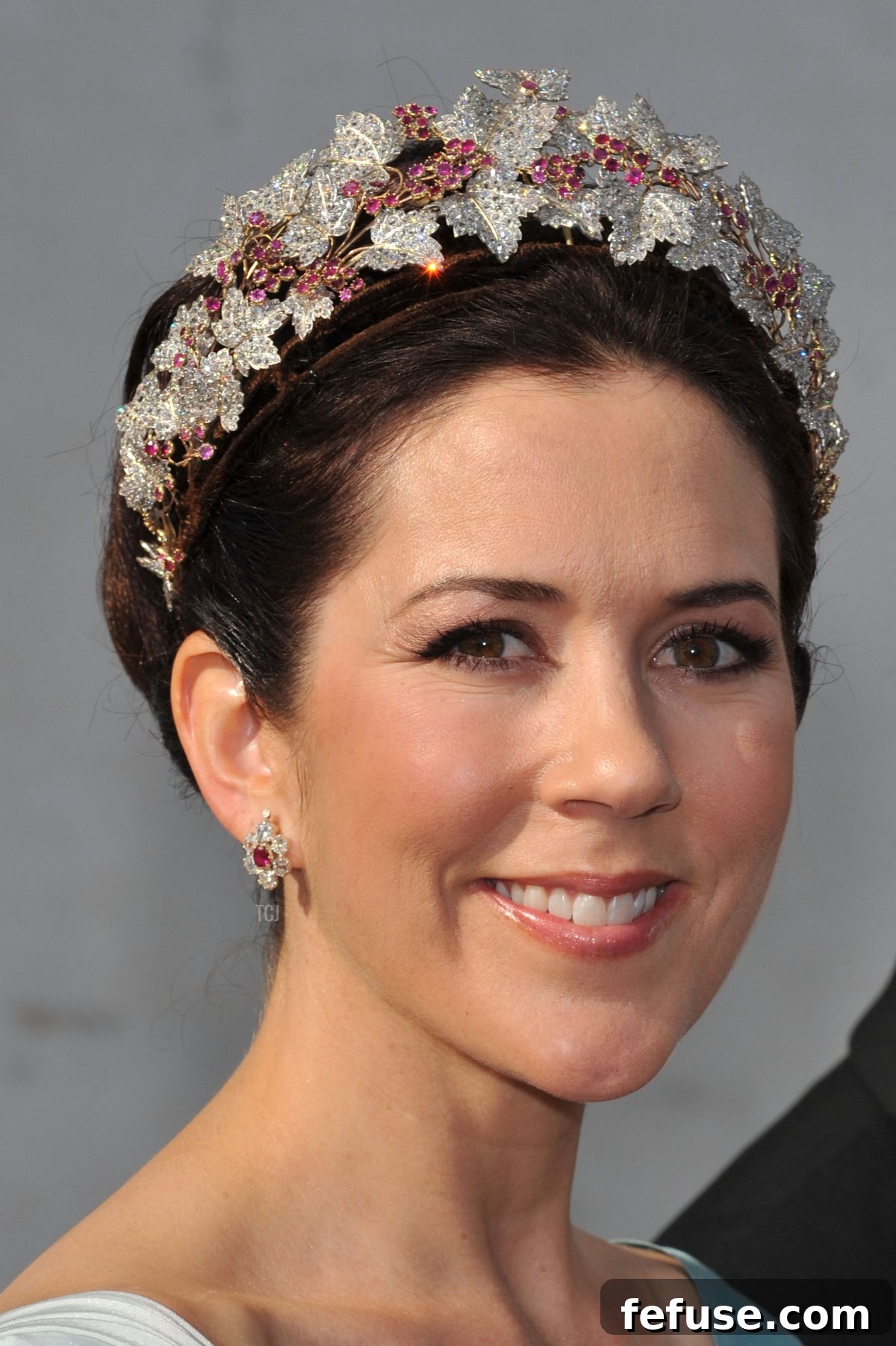 Close-up of Crown Princess Mary wearing the magnificent Danish Ruby Parure Tiara, featuring diamond leaves and ruby berries, at the 2008 royal wedding