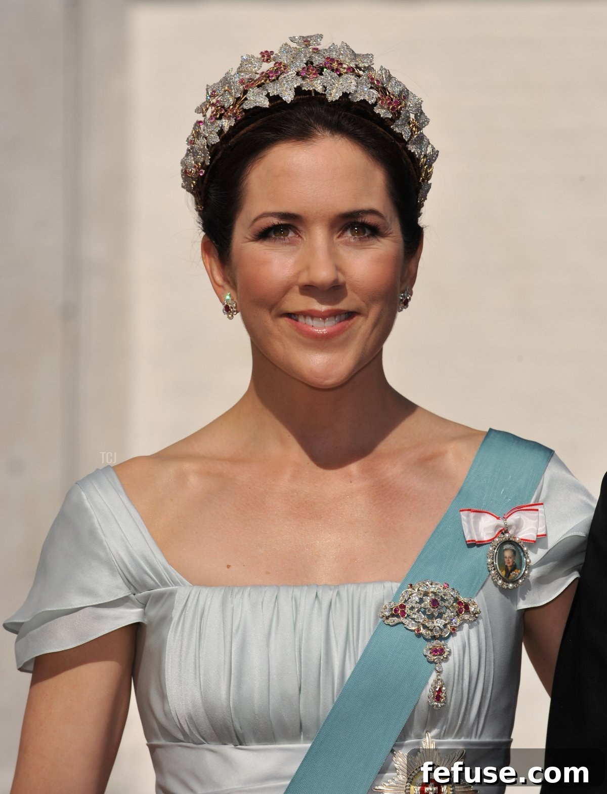 Crown Princess Mary of Denmark elegantly displays the ruby earrings and brooch from the Danish Ruby Parure, securing the Order of the Elephant sash