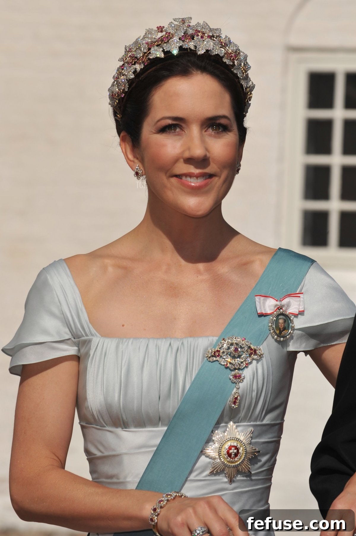 Close-up of Crown Princess Mary's hands, revealing a diamond ring on her right and her patriotic engagement and wedding rings on her left hand