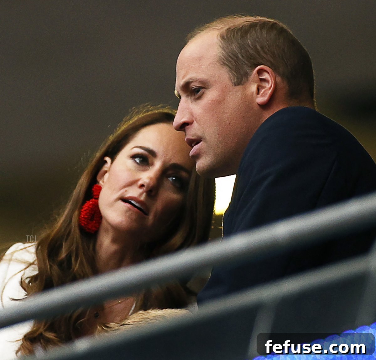 Prince William (R), Duke of Cambridge, listens to Catherine, Duchess of Cambridge, ahead of the UEFA EURO 2020 final football match between Italy and England at the Wembley Stadium in London on July 11, 2021