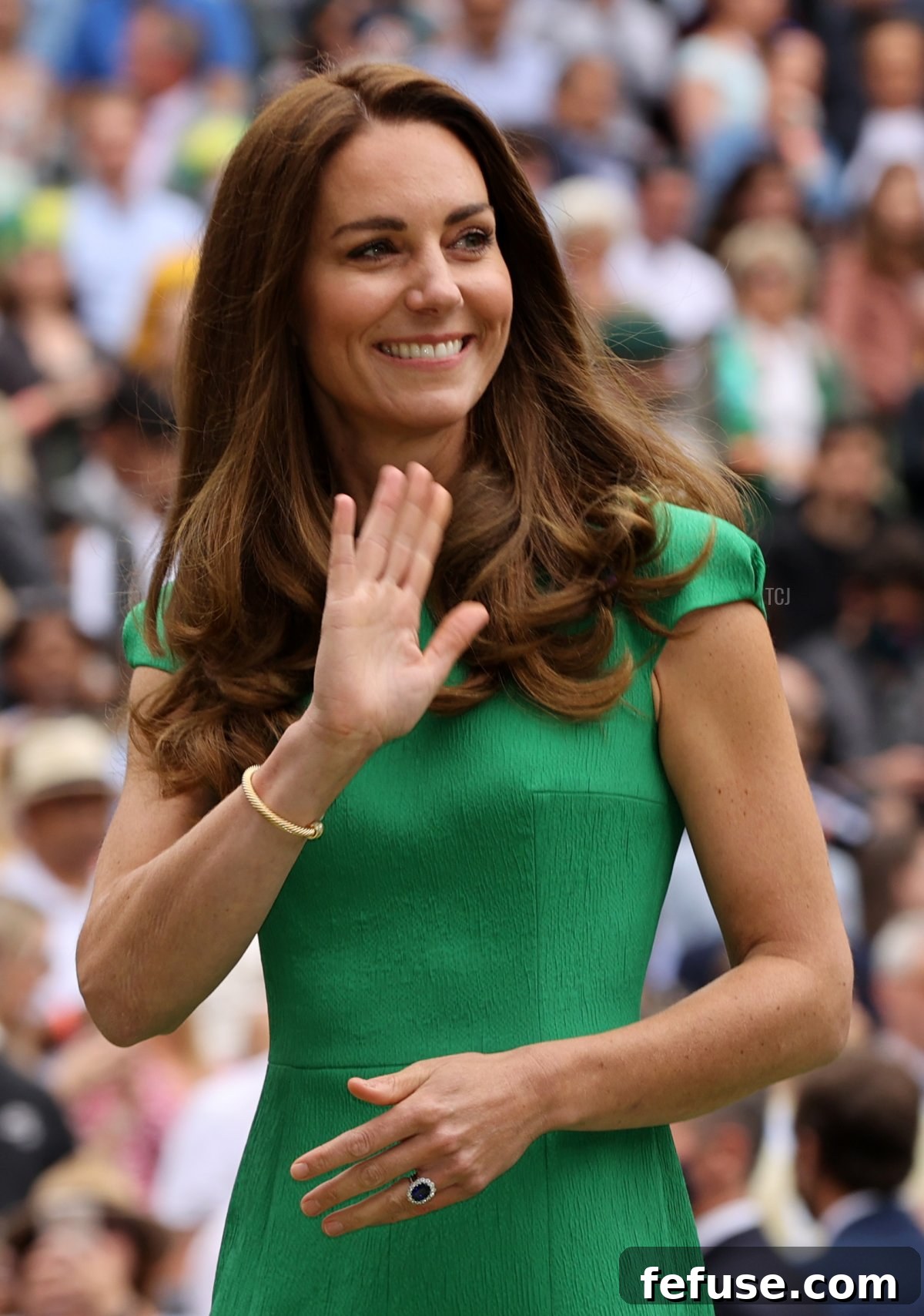 HRH Catherine, The Duchess of Cambridge waves to the crowd after the Ladies' Singles Final match between Ashleigh Barty of Australia and Karolina Pliskova of The Czech Republic on Day Twelve of The Championships - Wimbledon 2021 at All England Lawn Tennis and Croquet Club on July 10, 2021 in London, England