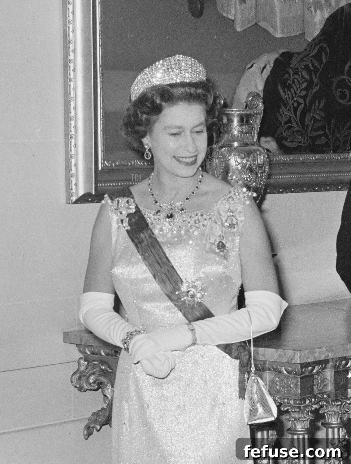 Queen Elizabeth II wearing the Baring Ruby Necklace, Queen Alexandra's Kokoshnik Tiara, and Queen Mary's Lover's Knot Brooch during a state visit to France in May 1972