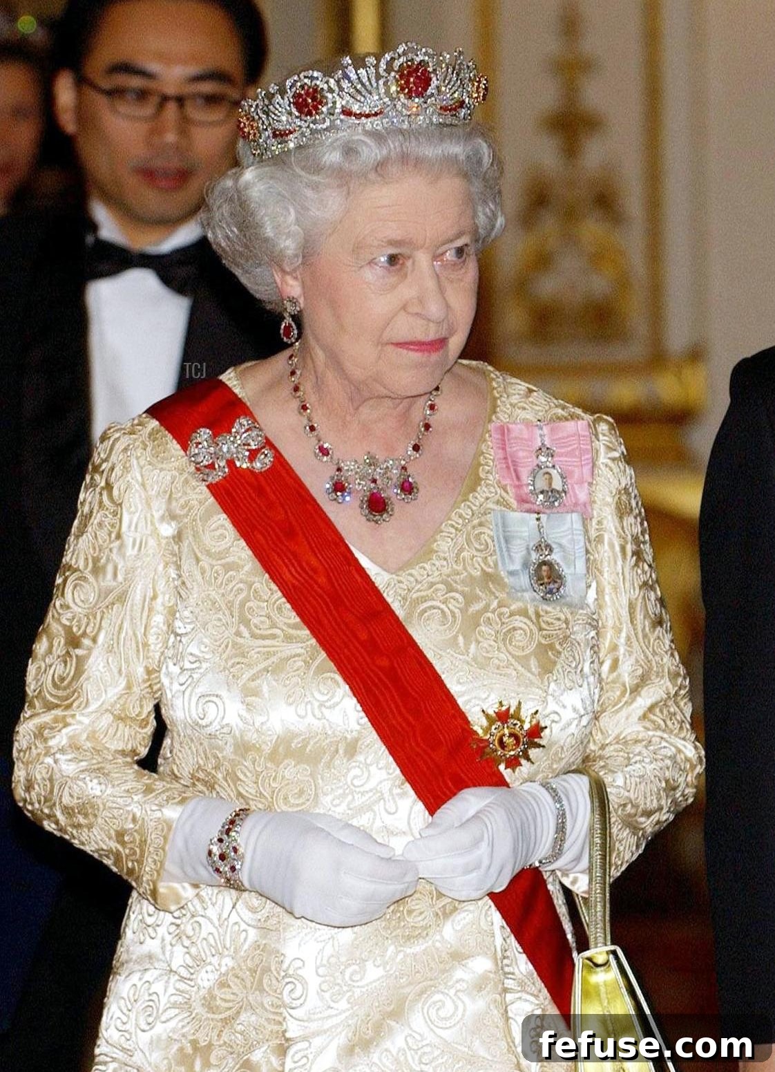 Queen Elizabeth II wears the Baring Ruby Necklace and Burmese Ruby Tiara for a state banquet with President Roh Moo-Hyun of South Korea at Buckingham Palace, December 2004