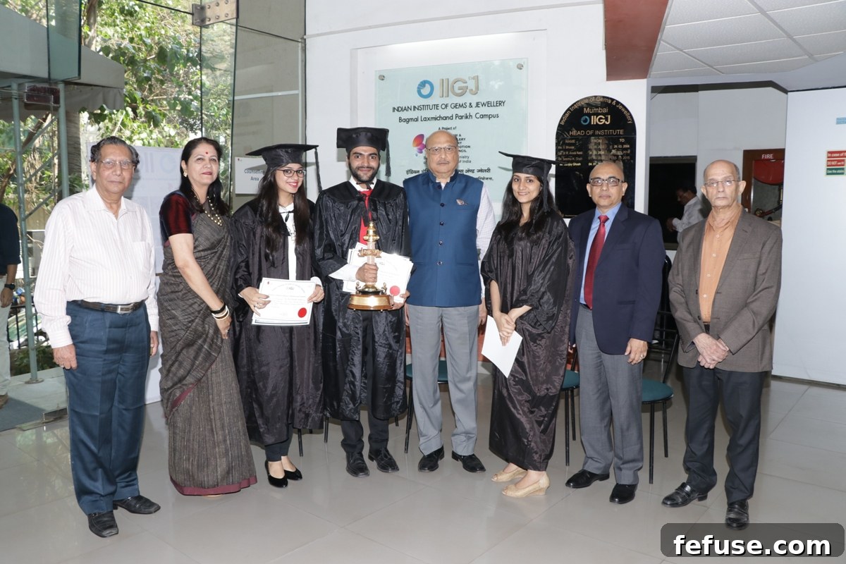 Distinguished guests including Mr. Nirmalkumar Barmecha, Ms. Namita Pandya, Mr. Premkumar Kothari, Mr. Sanjoy Ghosh, and Dr. R. K. Avasia with students at the IIGJ convocation.
