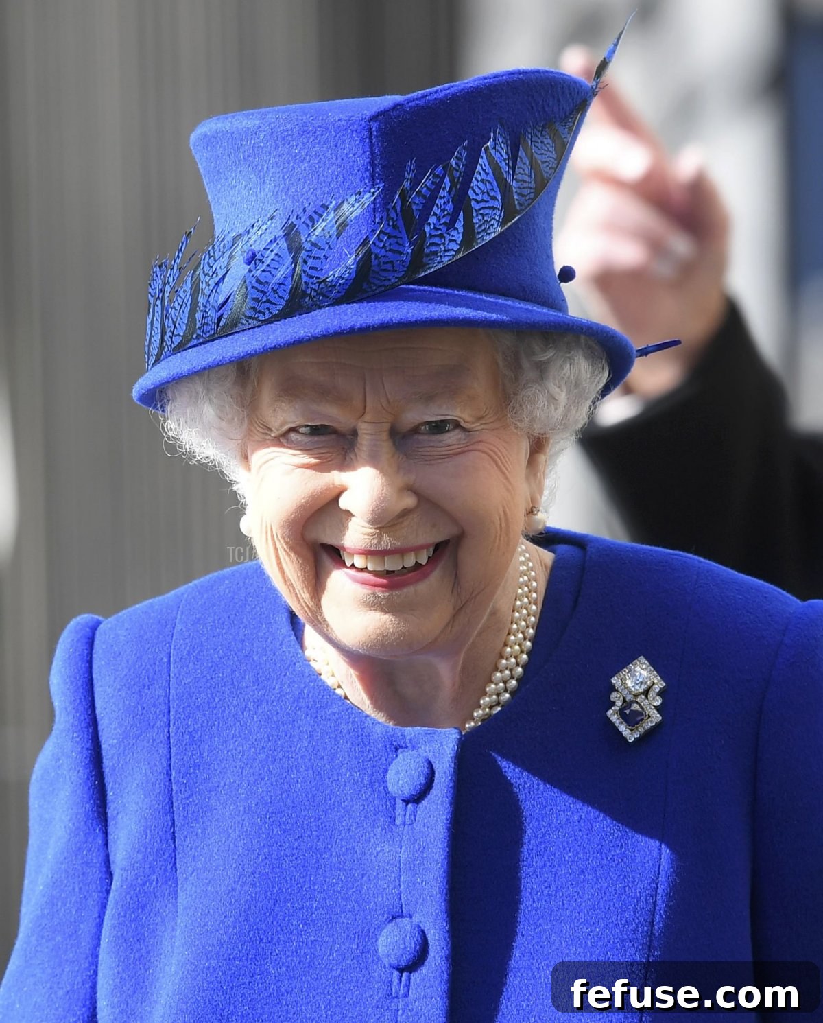 Queen Elizabeth II arrives with flowers for the unveiling of the new memorial to members of the armed services who served and died in the wars in Iraq and Afghanistan at Victoria Embankment Gardens on March 8, 2017 in London, England