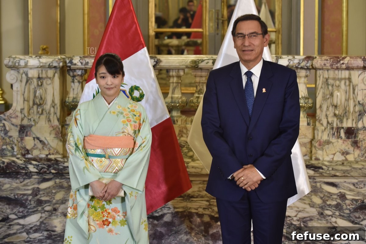 Japanese Princess Mako (L), the eldest daughter of Crown Prince Akishino, and Peru's President Martin Vizcarra pose for pictures during a meeting at the Palace of Goverment in Lima on July 11, 2019