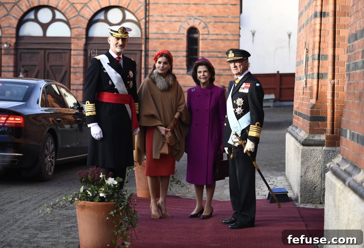 King Carl Gustaf of Sweden (R) and Queen Silvia of Sweden (2nd R) welcome King Felipe of Spain (L) and Queen Letizia of Spain at the Royal Stables, for the carriage procession to the Royal Palace, in Stockholm on November 24, 2021