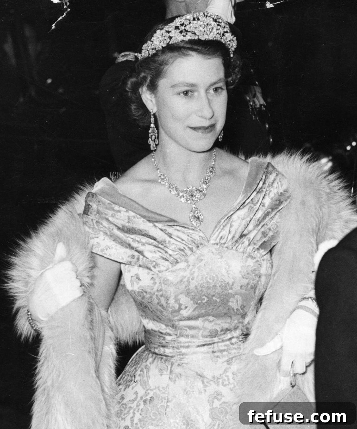 Queen Elizabeth II smiles as she is received by Prince Littler on arrival at the London Palladium for the Royal Command Variety Performance, 3 Nov 1952