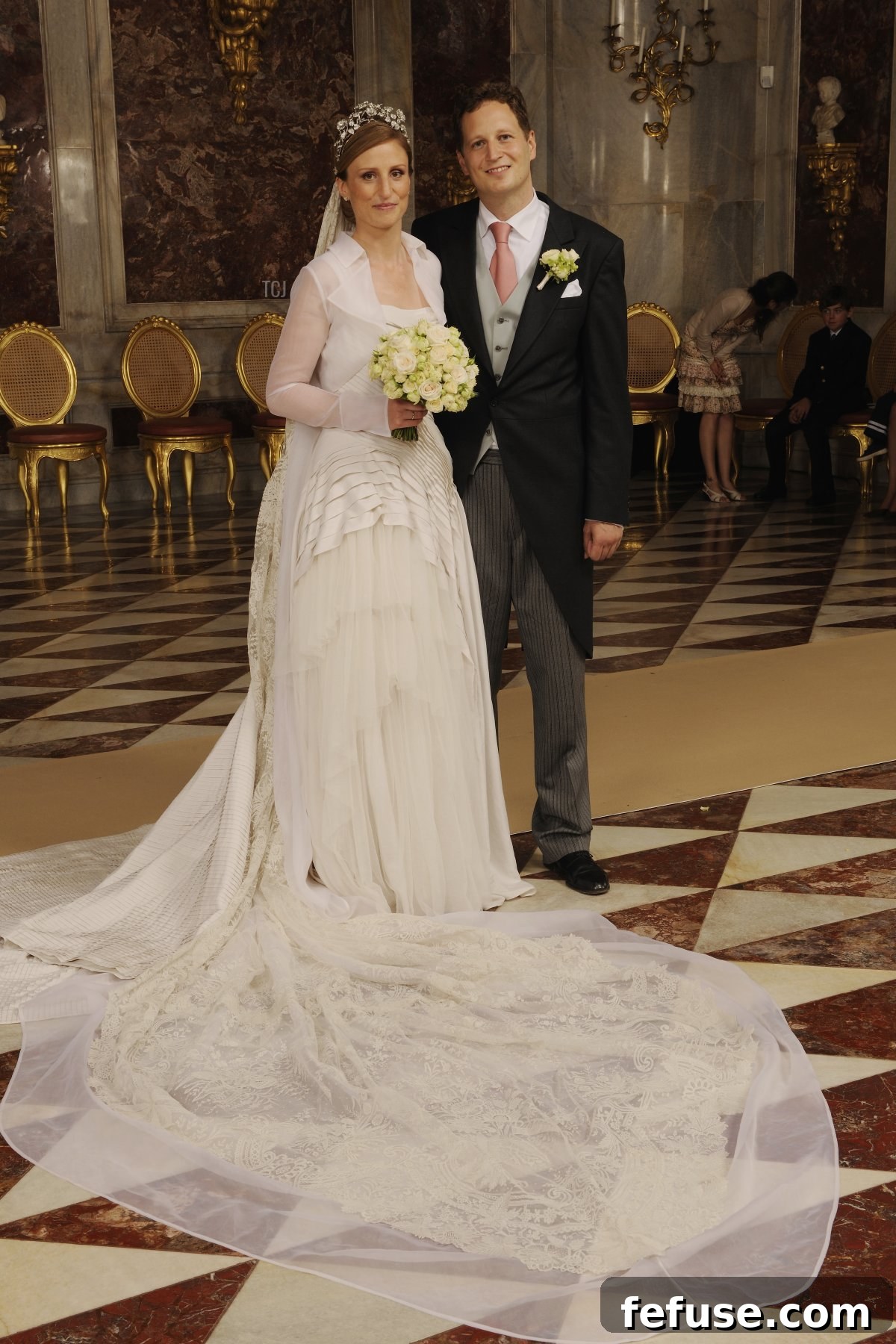 Prince Georg Friedrich of Prussia and Princess Sophie of Prussia posing for a family picture after their religious wedding ceremony in Friedenskirche Potsdam, Germany.