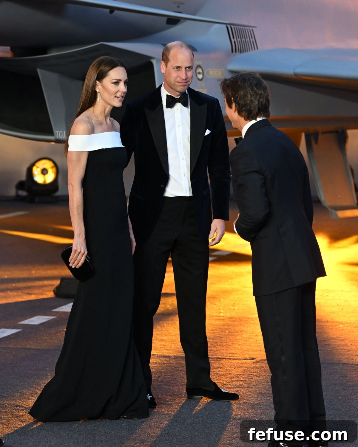 Britain's Prince William and Catherine, Duchess of Cambridge, engage with US actor Tom Cruise at the Top Gun: Maverick UK premiere in London, May 2022
