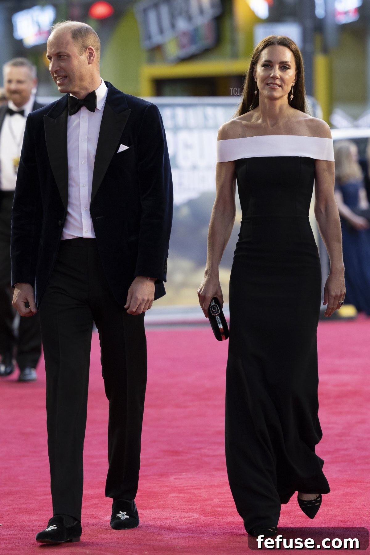 Prince William and Catherine, Duchess of Cambridge, arriving at the Royal Film Performance of Top Gun: Maverick in London, May 2022, showcasing Kate's elegant gown