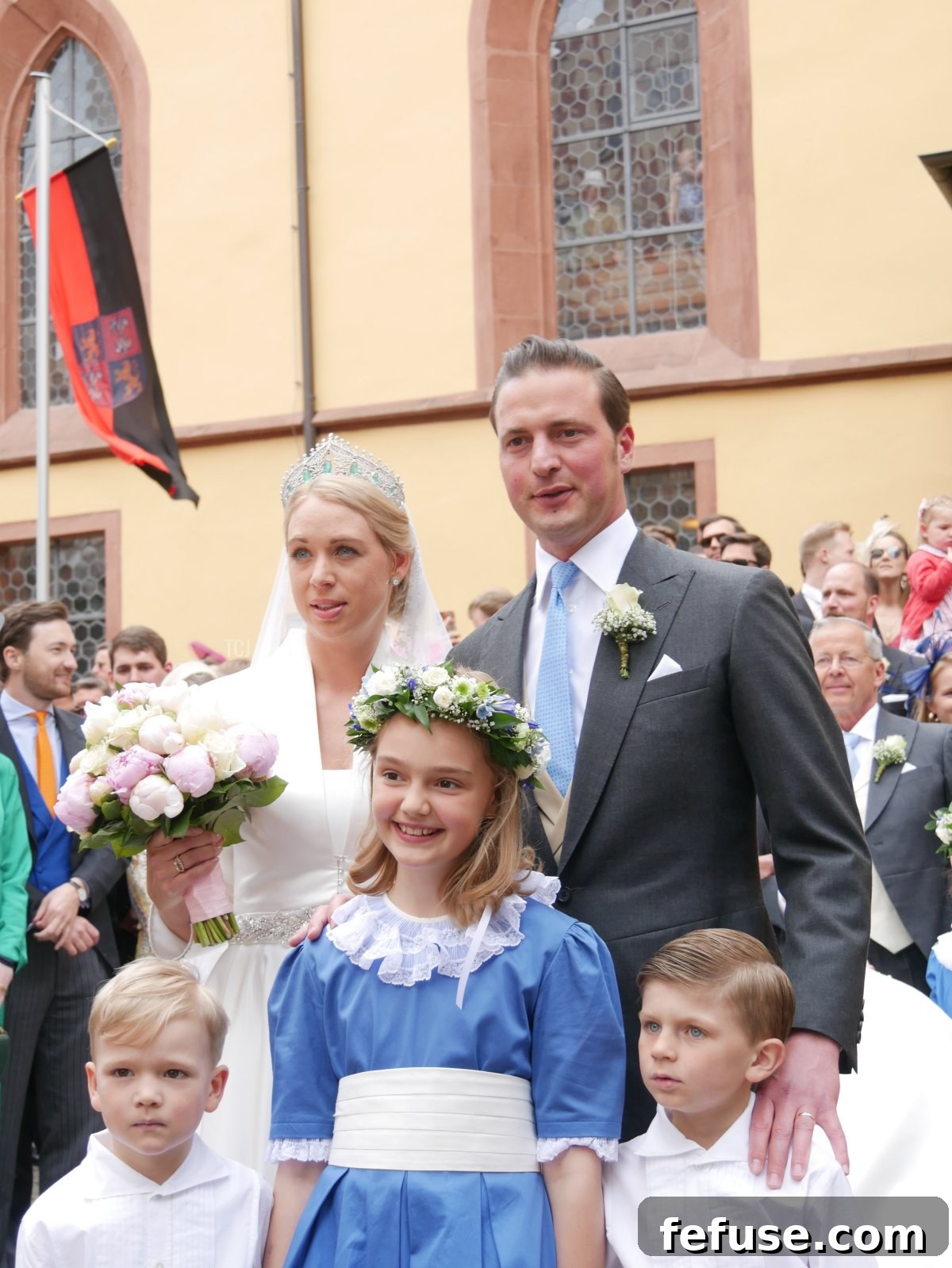 Germany's Princely Emerald Bridal Crown 9 Princess Amelie zu Löwenstein-Wertheim-Freudenberg and her groom, Benedikt Schmid von Schmidsfelden, smiling together on their wedding day in Wertheim.