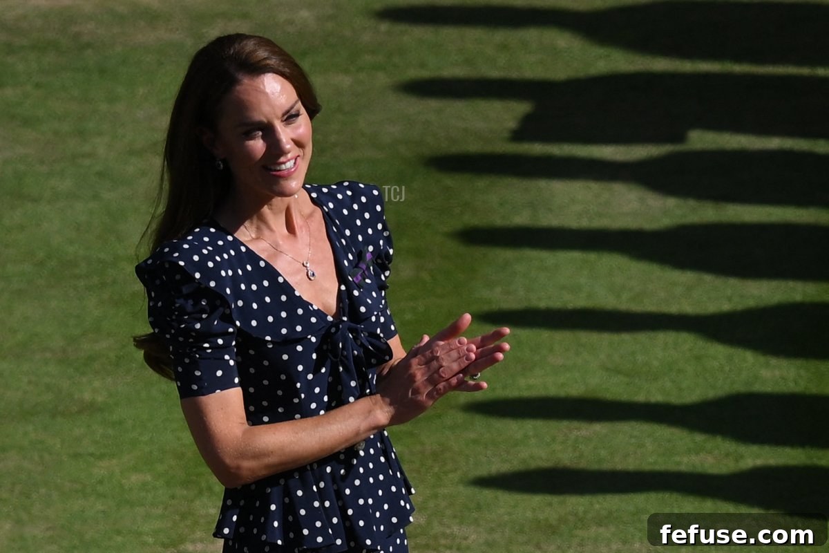 Britain's Catherine, Duchess of Cambridge, applauds during the trophy ceremony of the men's singles final tennis match between Serbia's Novak Djokovic and Australia's Nick Kyrgios on the fourteenth day of the 2022 Wimbledon Championships at The All England Tennis Club in Wimbledon, southwest London, on July 10, 2022