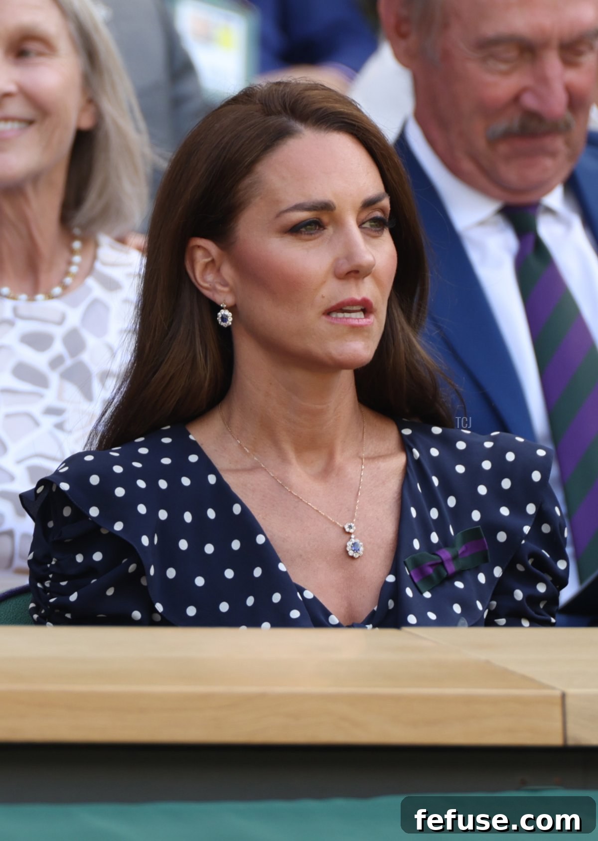 Ian Hewitt, The AELTC Chairman (L) and Catherine, Duchess of Cambridge are seen in the Royal Box watching Novak Djokovic of Serbia play Nick Kyrgios of Australia during their Men's Singles Final match on day fourteen of The Championships Wimbledon 2022 at All England Lawn Tennis and Croquet Club on July 10, 2022 in London, England