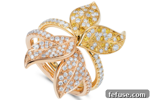 Petites Feuilles rings in rose and yellow gold worn as stacking rings