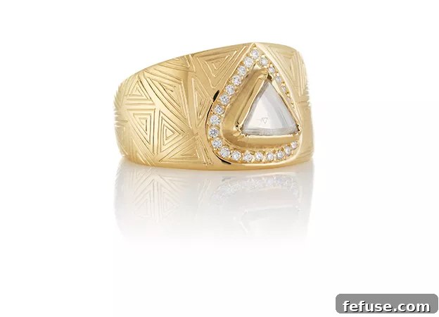 Brooke Gregson's Hera Engraved Triangle ring in 18k gold with a unique macle diamond and brilliant diamond accents