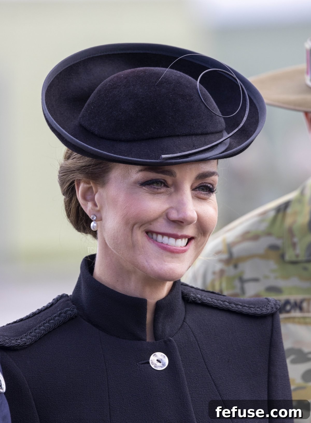 Prince William and Catherine, Princess of Wales, greet Commonwealth troops at Army Training Centre Pirbright, with Catherine wearing the Queen's Silver Jubilee Pearl Earrings.