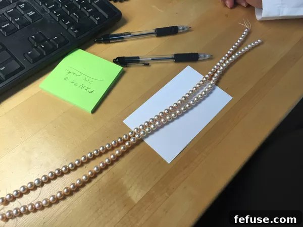 Lustrous metallic freshwater pearl strands, presented for selection at the PearlParadise.com private event