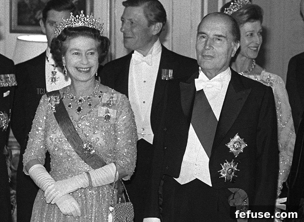 French President Francois Mitterrand (C), his wife Danielle and Queen Elizabeth II arrive at the French Ambassador's residence in London , October 25, 1984 where the President held a state banquet in honour of the Queen