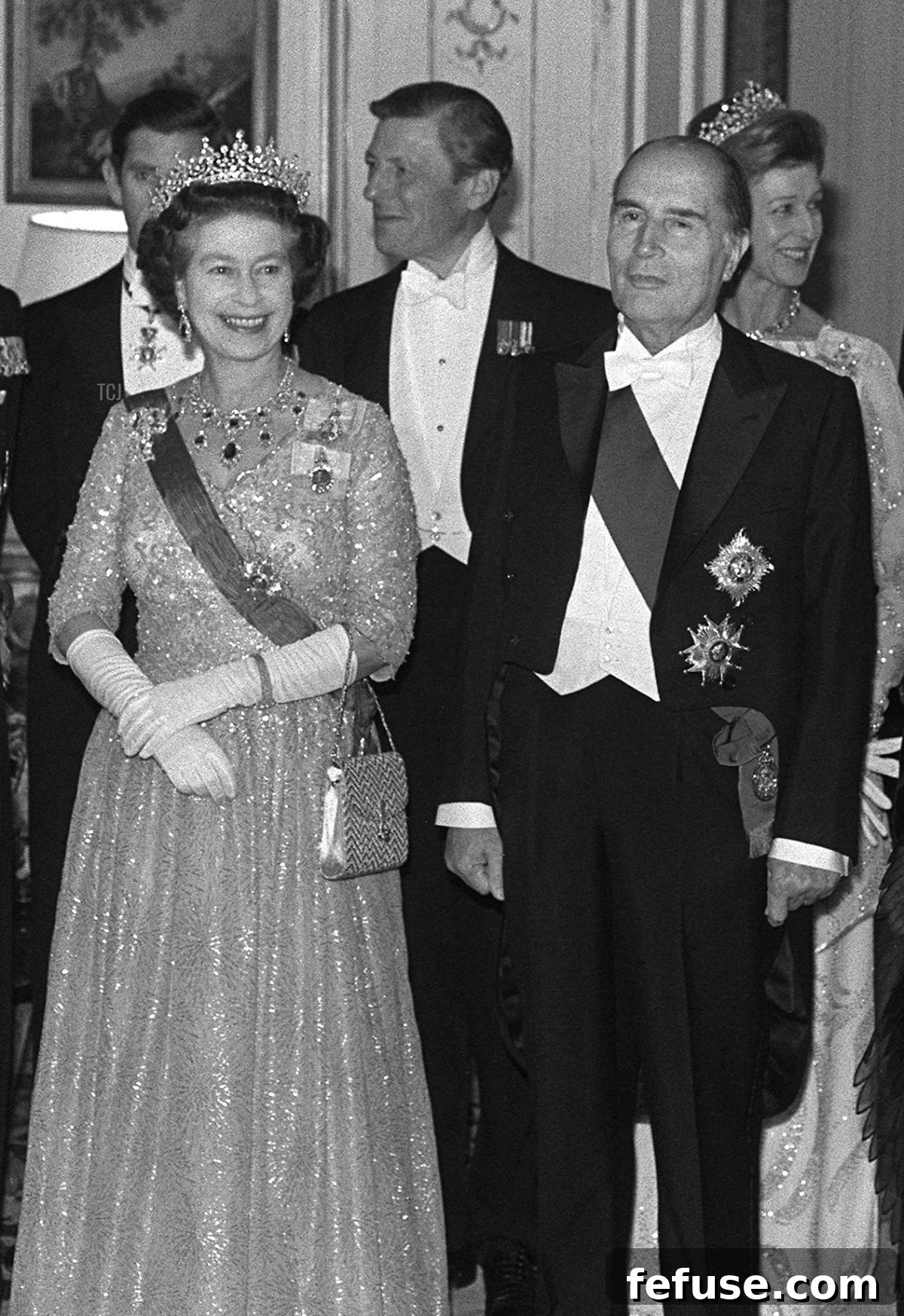 French President Francois Mitterrand (C), his wife Danielle and Queen Elizabeth II arrive at the French Ambassador's residence in London , October 25, 1984 where the President held a state banquet in honour of the Queen