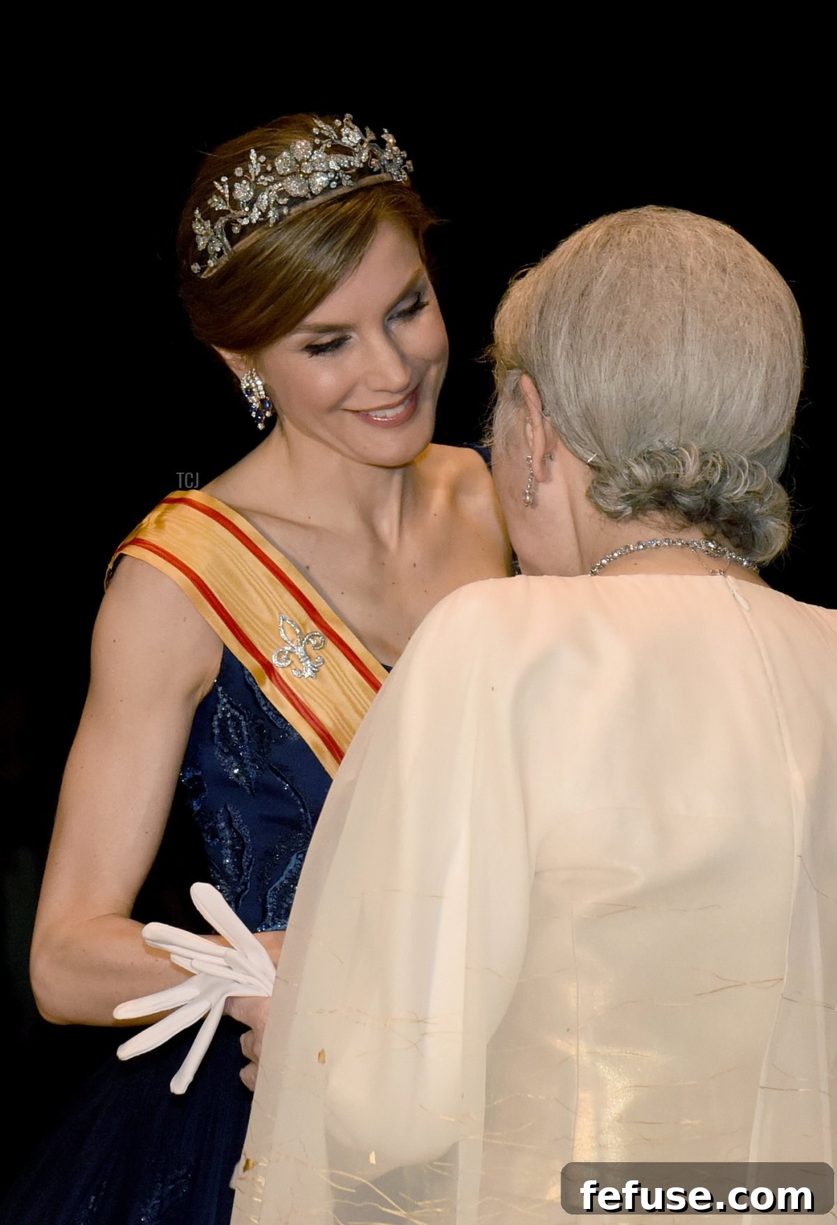 Queen Letizia Dazzles in Diamonds and Sapphires in Barcelona 11 Queen Letizia wearing sapphire earrings with the Spanish Floral Tiara at a state banquet in Tokyo, April 5, 2017